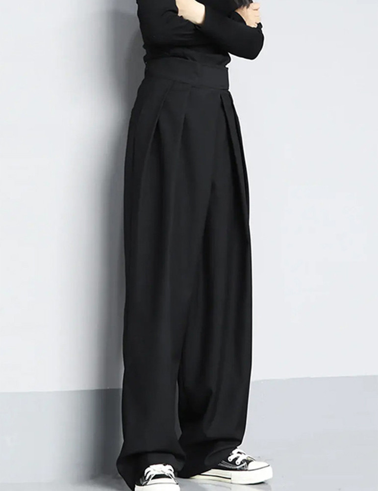 Pantaloni con chiusura a strappo e gamba larga