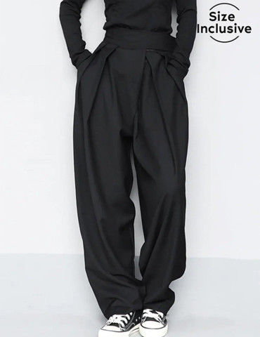 Pantaloni con chiusura a strappo e gamba larga